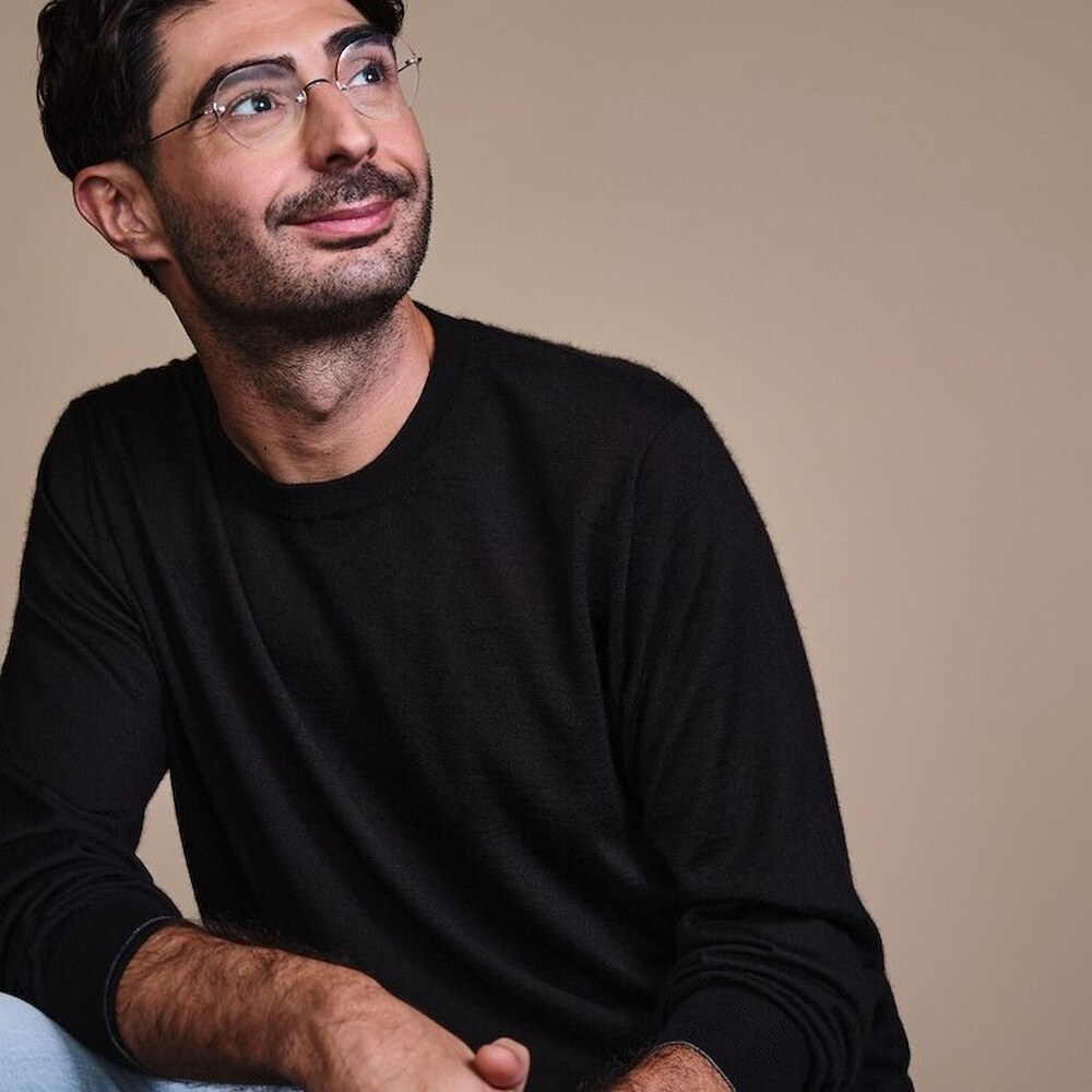 Lee Hnetinka, CEO of FutureAI, seated editorial portrait, 2026